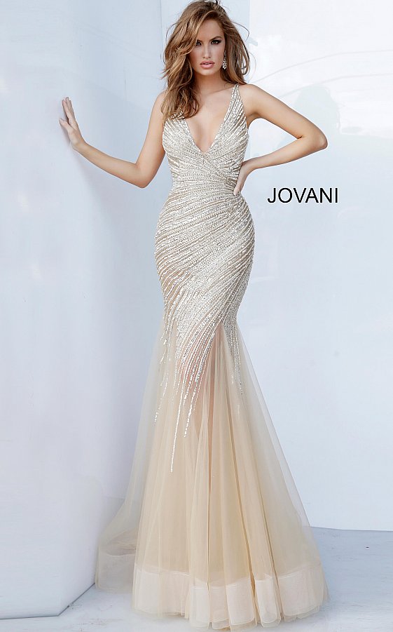Jovani 4741is a long 2020 Prom, Pageant & Formal Evening Dress. Featuring a Heavily crystal embellished bodice cascading into the Sheer flared trumpet tulle skirt. Deep V neckline with an open V back. Sheer mesh cutout side panels. Full Tulle Trumpet skirt. Perfect for Pageants & Red Carpet Events!  Available Colors: Nude, Sage  Available Sizes: 00,0,2,4,6,8,10,12,14,16,18,20,22,24