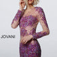 Jovani 47598 is a sheer beaded & Crystal Rhinestone Embellished short fitted cocktail dress. Featuring long sleeves & a high neckline short Formal evening gown is perfect for Prom, Pageant, homecoming & More!  Available Colors: Fuchsia/Nude, Teal/Nude  Available Sizes:  00-24
