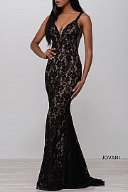 Jovani 48994 Stretch lace prom dress embellished with heat set stones, nude underlay, fitted silhouette, straps over shoulders, plunging v neckline with sheer mesh, sheer mesh inserts along the sides, sweeping train, low v back. Makes an excellent pageant gown or evening gown. 