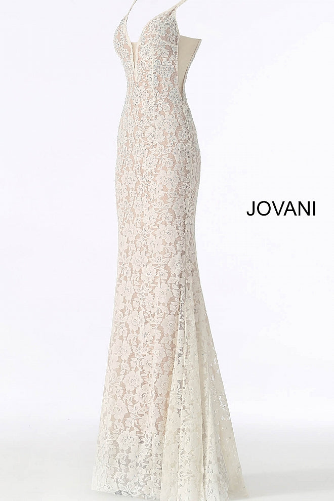 Jovani 48994 Stretch lace prom dress embellished with heat set stones, nude underlay, fitted silhouette, straps over shoulders, plunging v neckline with sheer mesh, sheer mesh inserts along the sides, sweeping train, low v back. Makes an excellent pageant gown or evening gown. 