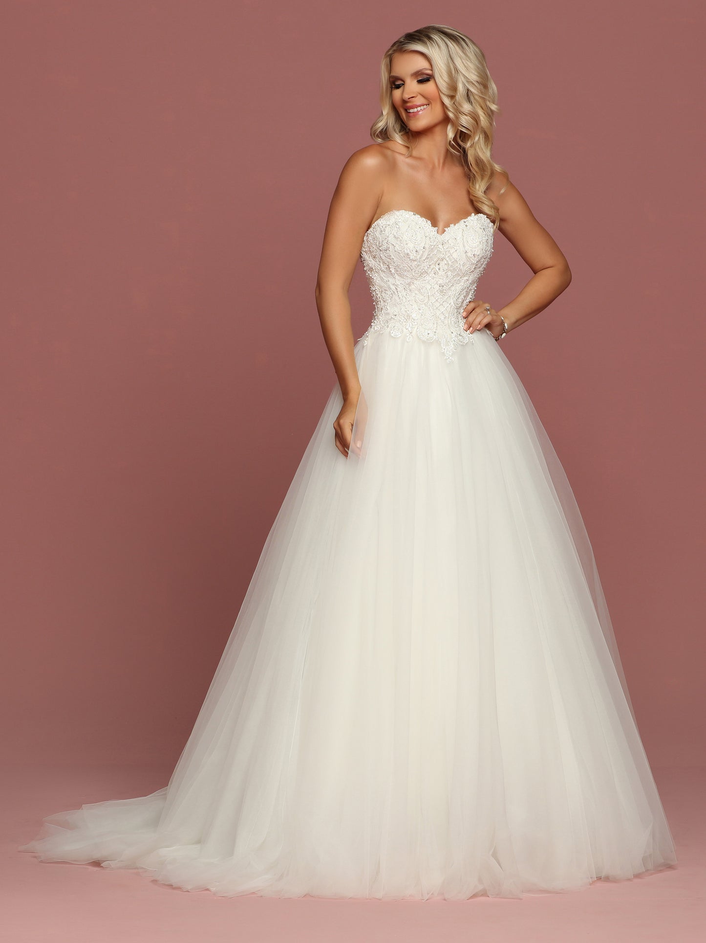Davinci Bridal 50487 is a strapless sweetheart Tulle ballgown wedding dress. Featuring an Embellished lace bodice cascading into the lush tulle skirt. Corset Lace up back.  Available for 1-2 Week Delivery!!!  Available Sizes: 2,4,6,8,10,12,14,16,18,20  Available Colors: Ivory