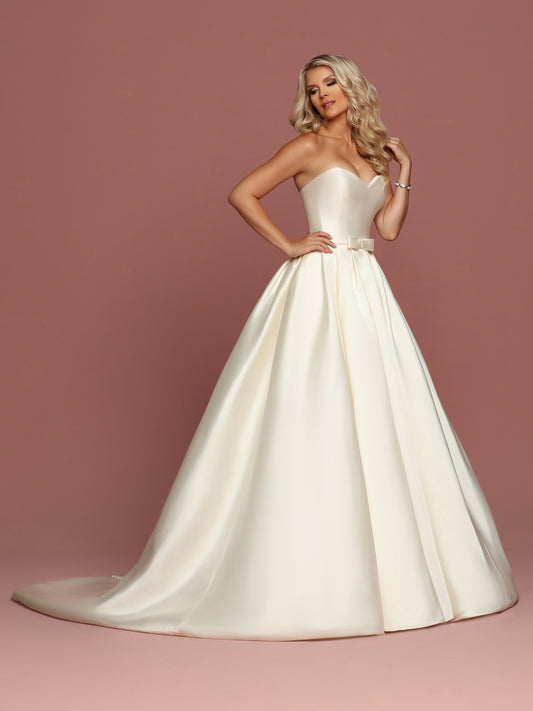 Davinci Bridal 50494 is a gorgeous Mikado Wedding Dress. Strapless Sweetheart neckline with a simple waist belt with bow. Full Pleated skirt has Pockets! Button line the entire back seam of the gown into the train.  Available for 1-2 Week Delivery!!!  Available Sizes: 2,4,6,8,10,12,14,16,18,20  Available Colors: Ivory