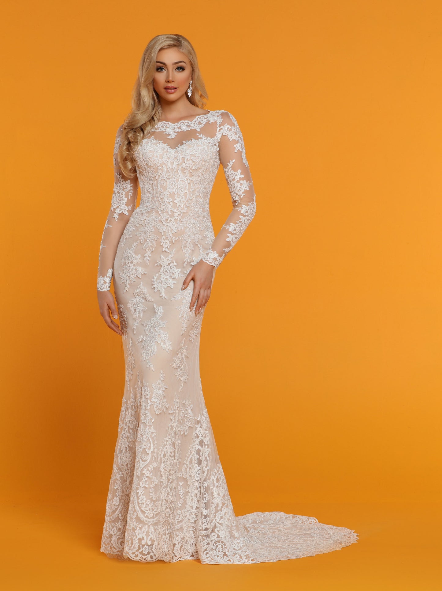 Davinci Bridal 50516 is a Fit & Flare Mermaid Wedding Dress. Featuring a sheer tulle & Lace Illusion Neckline back with scallop lace keyhole cut outs in the back with buttons lining the back seam. Sheer lace long sleeves.  Available for 1-2 Week Delivery!!!  Available Sizes: 2,4,6,8,10,12,14,16,18,20  Available Colors: Ivory/Nude, Ivory/Ivory