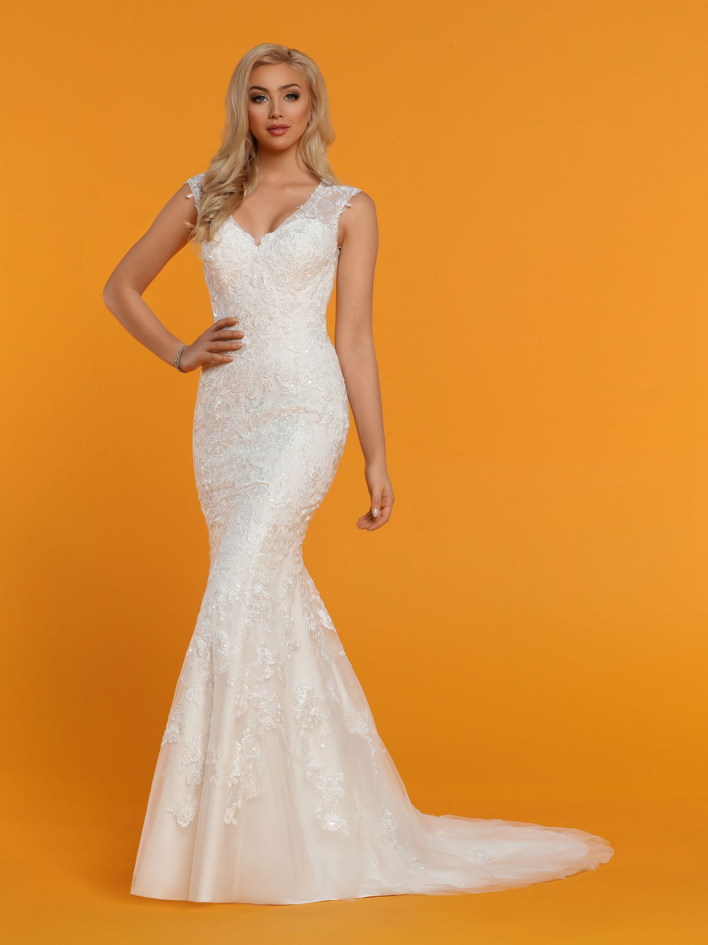 Davinci Bridal 50523 is a Long Fitted Fit & Flare Mermaid Embellished Wedding Dress. Featuring sheer lace embellished straps and back with button lined closure. Sequins scattered throughout the entire gown for a magical look.  Available for 1-2 Week Delivery!!!  Available Sizes: 2,4,6,8,10,12,14,16,18,20