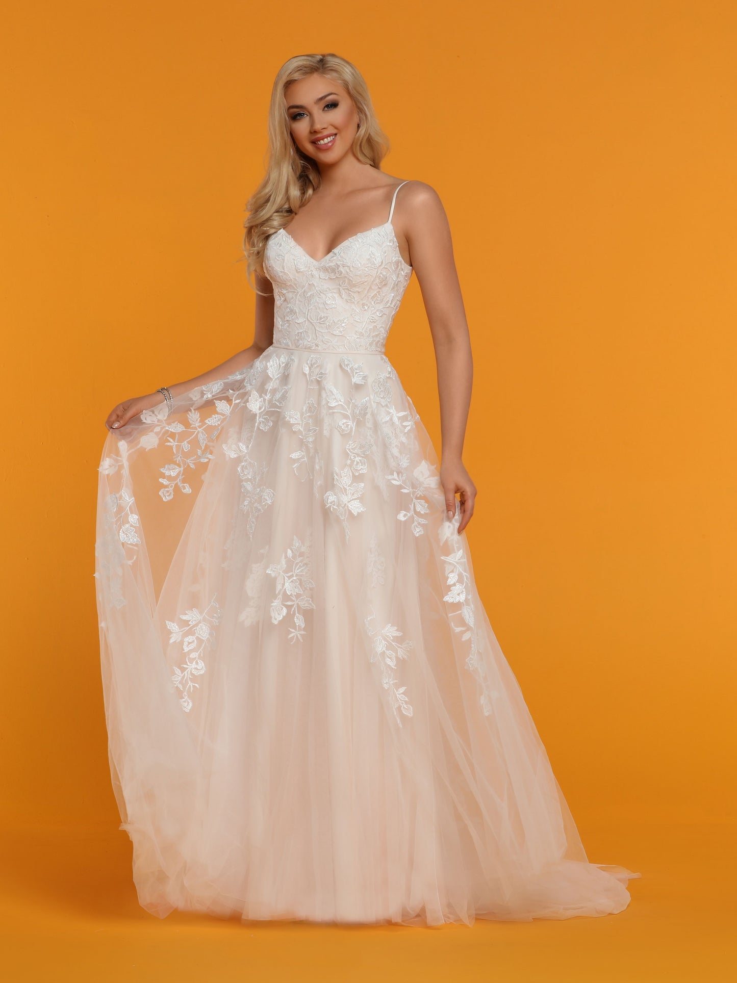 Davinci Bridal 50536 is a soft tulle A Line Wedding Dress Featuring Hand Embellished Lace Over Tulle. V Neckline with spaghetti straps and an open V Back. Long tulle train.  Available for 1-2 Week Delivery!!!  Available Sizes: 2,4,6,8,10,12,14,16,18,20  Available Colors: Ivory/Blush, Ivory/Ivory