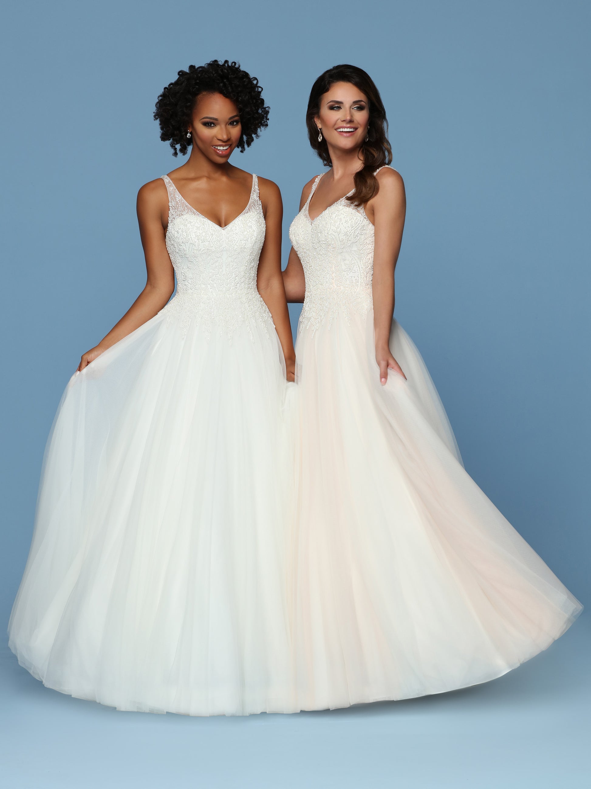 Davinci Bridal 50544 is a Beautiful Lush Soft Tulle A Line Ball Gown with a Hand Embellished Bodice cascading into to tulle skirt. Sweetheart Neckline with a sheer Illusion V Neck and straps leading around to an open V back.  Available for 1-2 Week Delivery!!!  Available Sizes: 2,4,6,8,10,12,14,16,18,20  Available Colors: Ivory/Blush, Ivory/Ivory