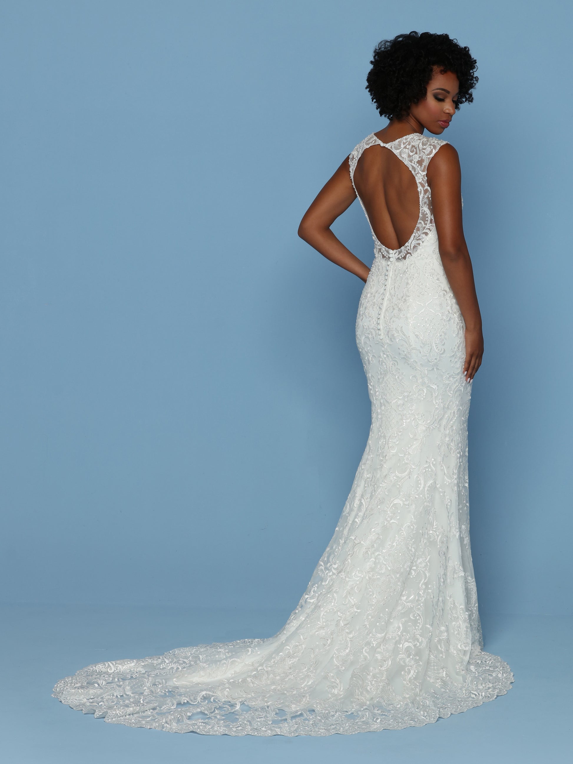 Davinci Bridal 50546 is an Embroidered Tulle Fitted Mermaid Silhouette. V Neckline with Sheer Embellished Cap Sleeve leading to a Sheer Illusion Keyhole Cutout Open Back.Button lined Zipper seam, Train with Embroidered lace edge.  Available for 1-2 Week Delivery!!!  Available Sizes: 2,4,6,8,10,12,14,16,18,20  Available Colors: Ivory