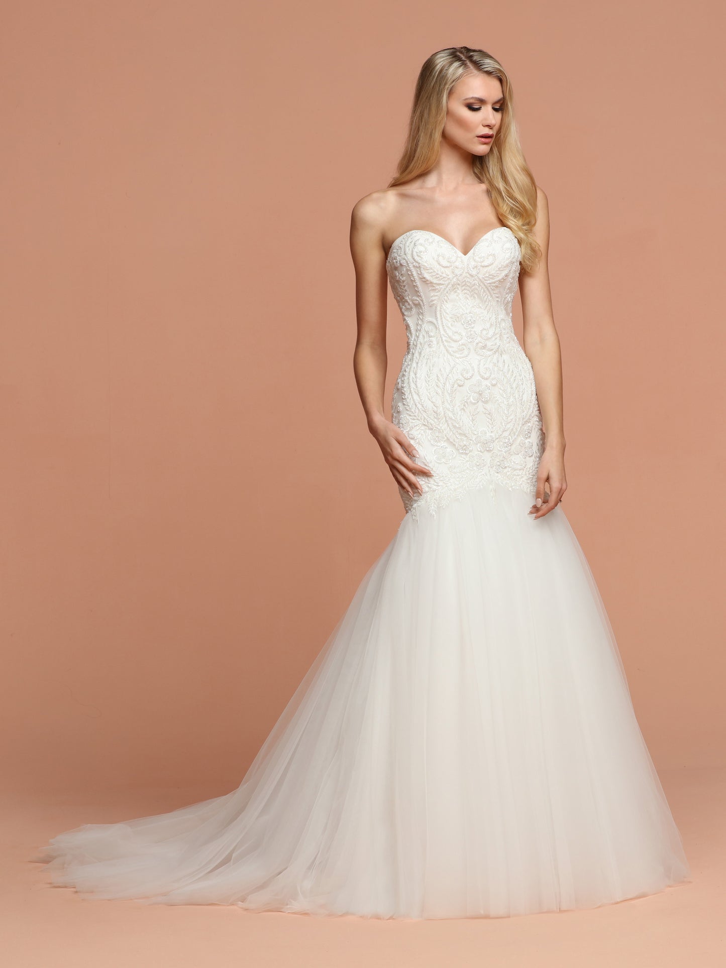 Davinci Bridal 50575 is a Gorgeous Fit & Flare Mermaid Silhouette with a strapless sweetheart neckline. The back features a lace up corset. The Fitted bodice of this gown is hand Embellished with Intricate Beading on lace. The Fulle Tulle Trumpet Skirt has a beautiful train.  Available for 1-2 Week Delivery!!!  Available Sizes: 2,4,6,8,10,12,14,16,18,20  Available Colors: Ivory