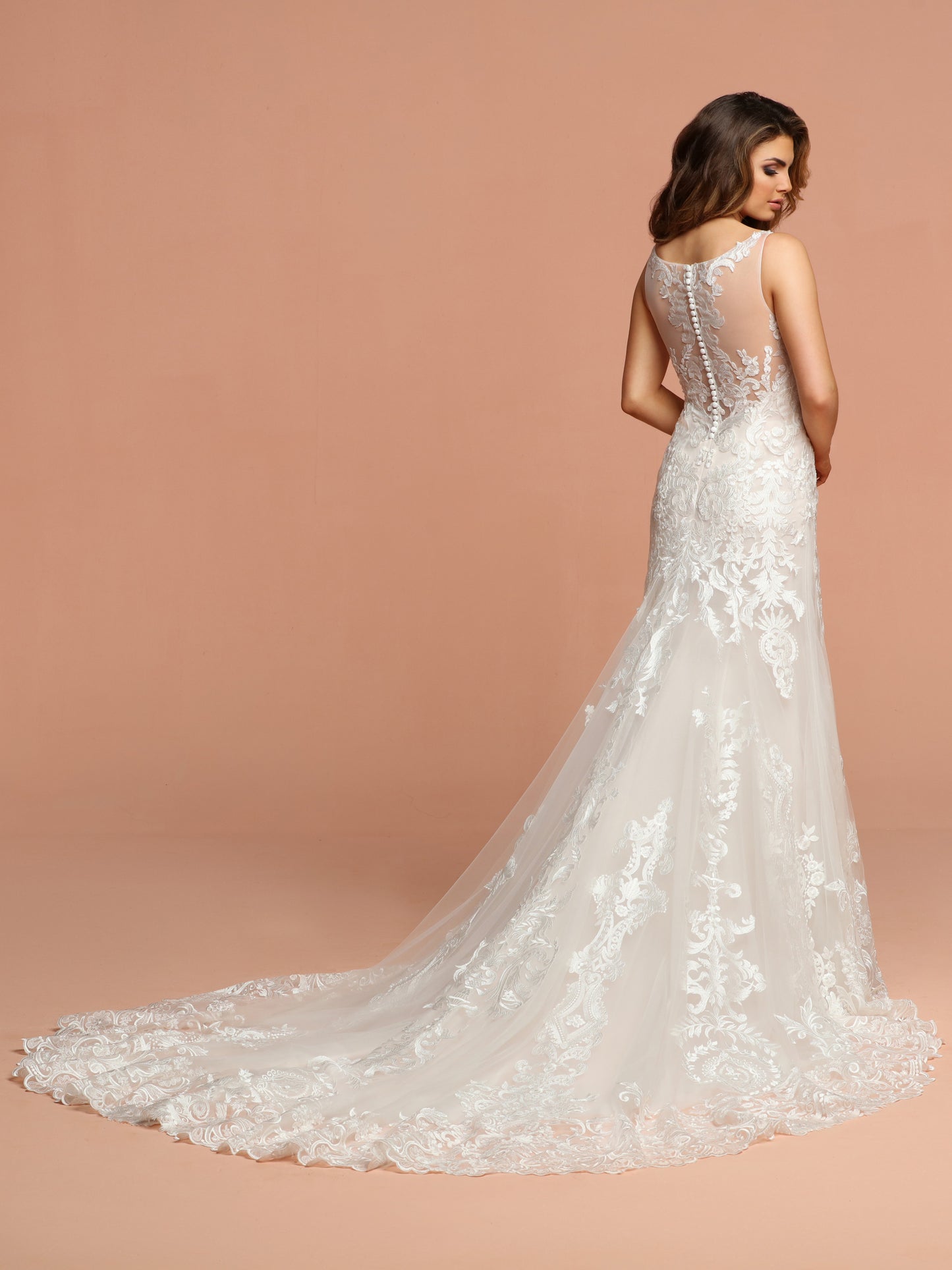 Davinci Bridal 50578 is a stunning Lace Mermaid Silhouette Fit & Flare Wedding Dress. Fitted Bodice with lace overlay on tulle. Plunging V Neckline with lace straps leading to a sheer illusion tulle back with lace tattoo effect. Elaborate lace edge on the lush skirt. Button Back seam.  Available for 1-2 Week Delivery!!!  Available Sizes: 2,4,6,8,10,12,14,16,18,20  Available Colors: Ivory/Blush, Ivory/Ivory