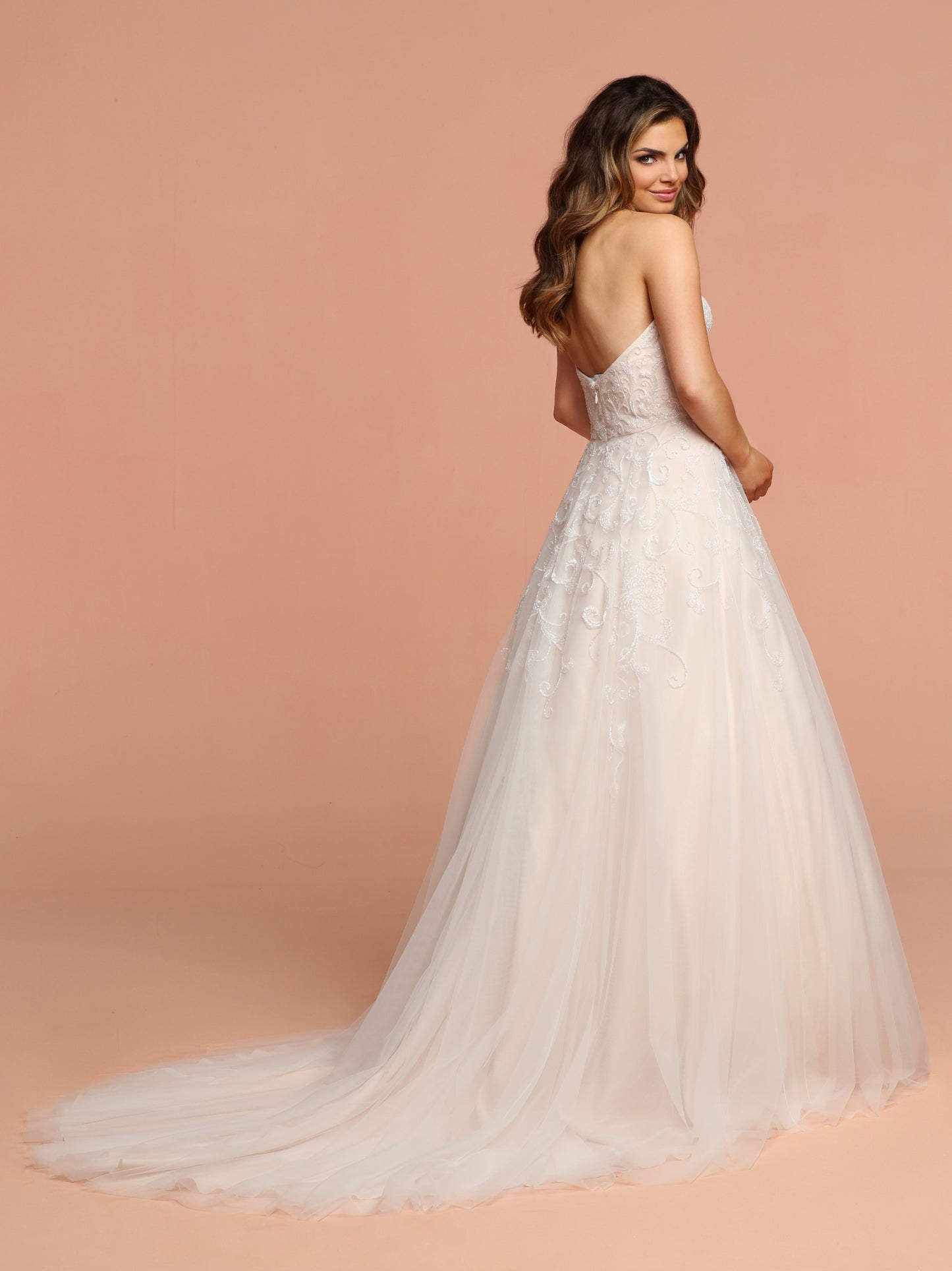 Davinci Bridal 50581 is a Beautiful Tulle Ballgown Wedding Dress. This gown features delicate Hand beading along the bodice, cascading down into the skirt. Strapless Sweetheart neckline.  Available for 1-2 Week Delivery!!!  Available Sizes: 2,4,6,8,10,12,14,16,18,20  Available Colors: Ivory/Blush, Ivory/Ivory