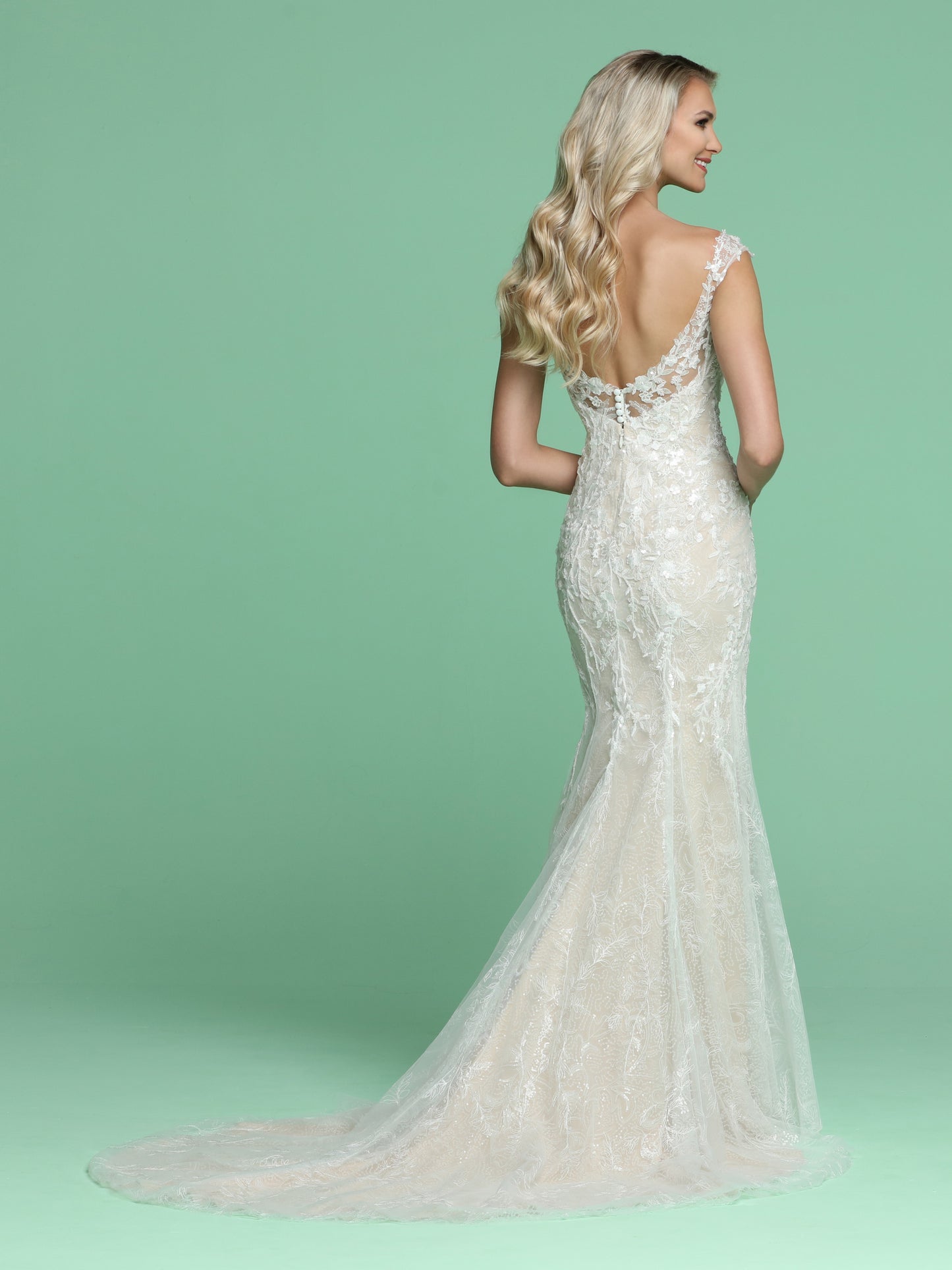 Davinci Bridal 50602 is a long Lace over Lace Floral applique Mermaid silhouette wedding Dress. This Bridal Gown Features a deep sweetheart neckline with off the shoulder sheer lace cap sleeves wrapping around to a sheer lace applique upper V back with buttons. Petite Sequins embellish this detailed lace. Sweeping lace Train!  Available for 1-2 Week Delivery!!!  Available Sizes: 2,4,6,8,10,12,14,16,18,20  Available Colors: Ivory/Ivory, Ivory/Nude