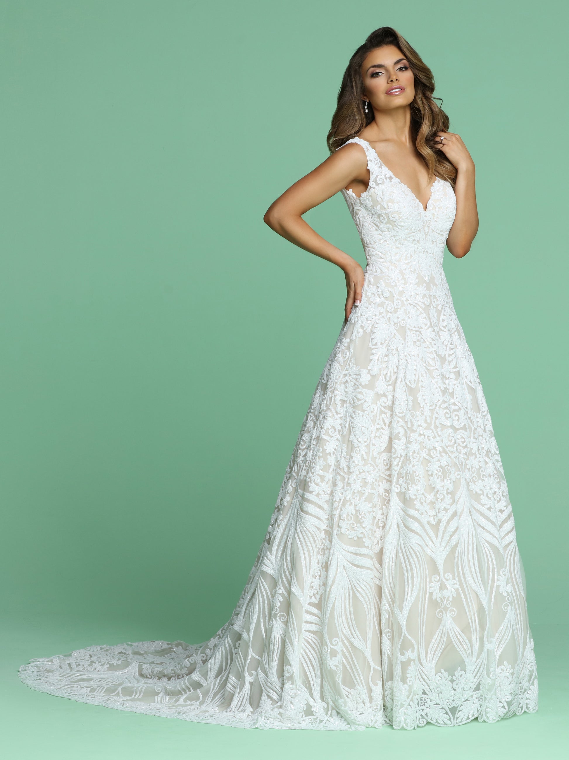 Davinci Bridal 50613 is a stunning long A Line Sequin Pattern Wedding Dress. Featuring a V Neckline with wide straps leading around to an open V back. This Shimmering gown is a true Fairytale Princess Gown!  Available for 1-2 Week Delivery!!!  Available Sizes: 2,4,6,8,10,12,14,16,18,20  Available Colors: Ivory/Blush, Ivory/Ivory  Available Sizes: 2-30  Available Colors: Ivory/Blush, Ivory/Ivory, White/White