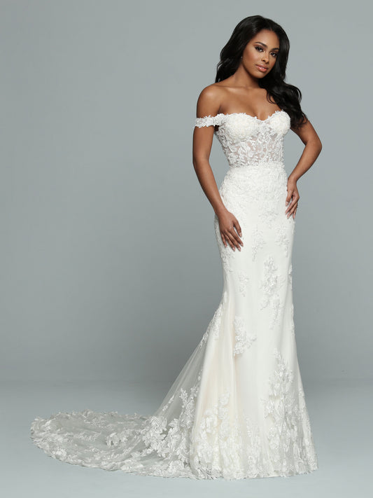 Davinci Bridal 50664 is a stunning lace fit & Flare formal bridal gown. off the shoulder lace straps and a sheer lace fitted bodice. Long tulle lace embellished train. Great sultry wedding style!   Available Size: 16  Available Color: Ivory/Ivory