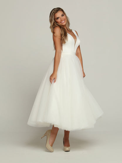 Davinci Bridal 50685 Tea length Ballgown removable skirt wedding dress Bridal Gown Tulle Two Looks in one, this Two-Piece Satin & Tulle A-Line Ball Gown Wedding Dress starts with a Plunging V-Neckline & Sheer Side Panels. The Scoop Back has a Sheer Overlay with a Covered Button Trim. Remove the Top Skirt with its Chapel Train to reveal a Pretty Tea Length Dress.