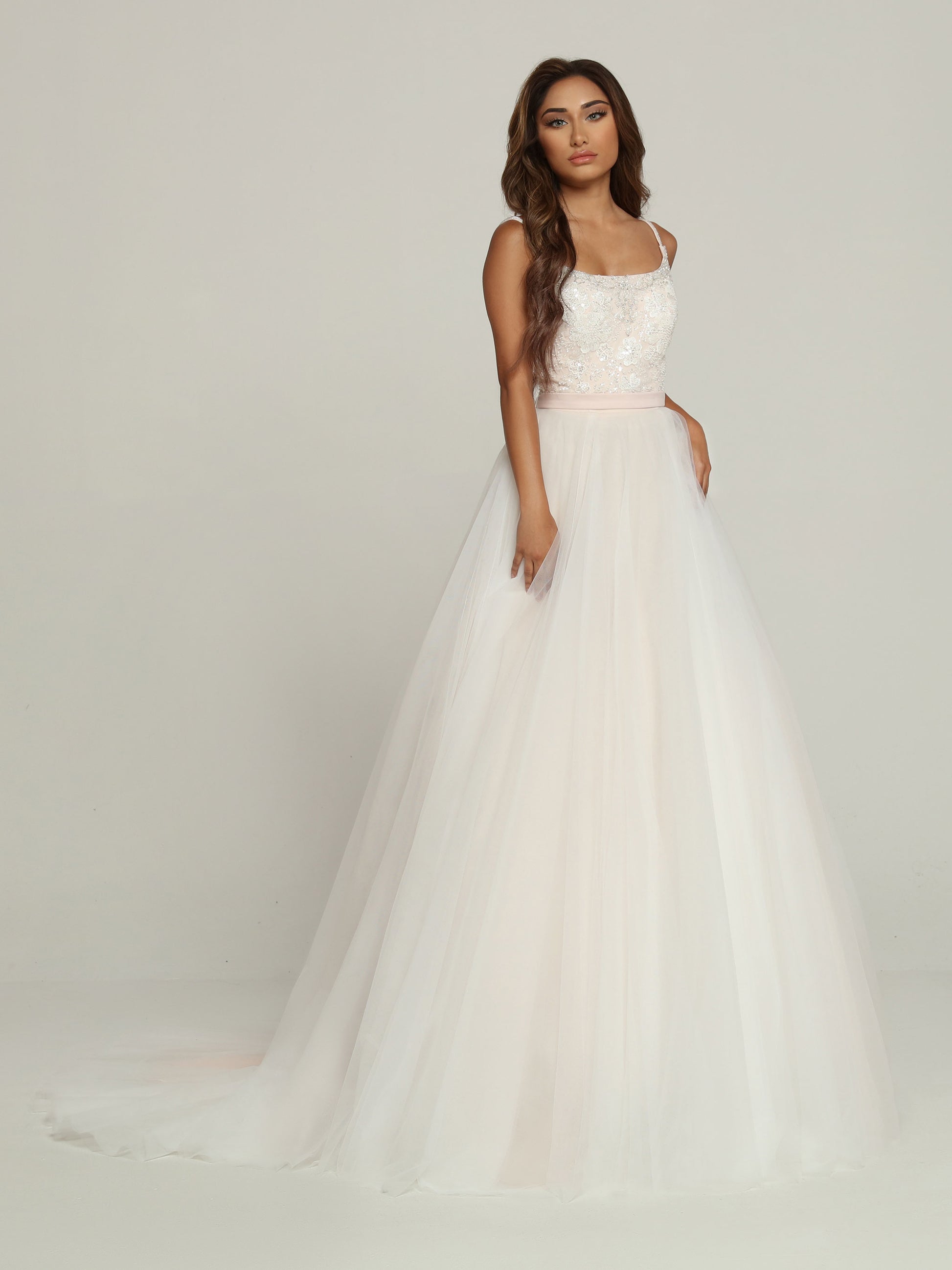 Davinci Bridal 50687 A Line Tulle Wedding Dress Beaded Baby Doll Bodice Bridal Gown Beautiful & Modest, this Fairytale Tulle A-Line Ball Gown Wedding Dress features a High Scoop Neckline, Deep V-Back & Slender Shoulder Straps. Beaded Lace Applique Covers the Bodice & Straps & Sets off the Generously Layered Tulle Skirt with Chapel Train. A Slender Waistband Belt is the Finishing Touch.