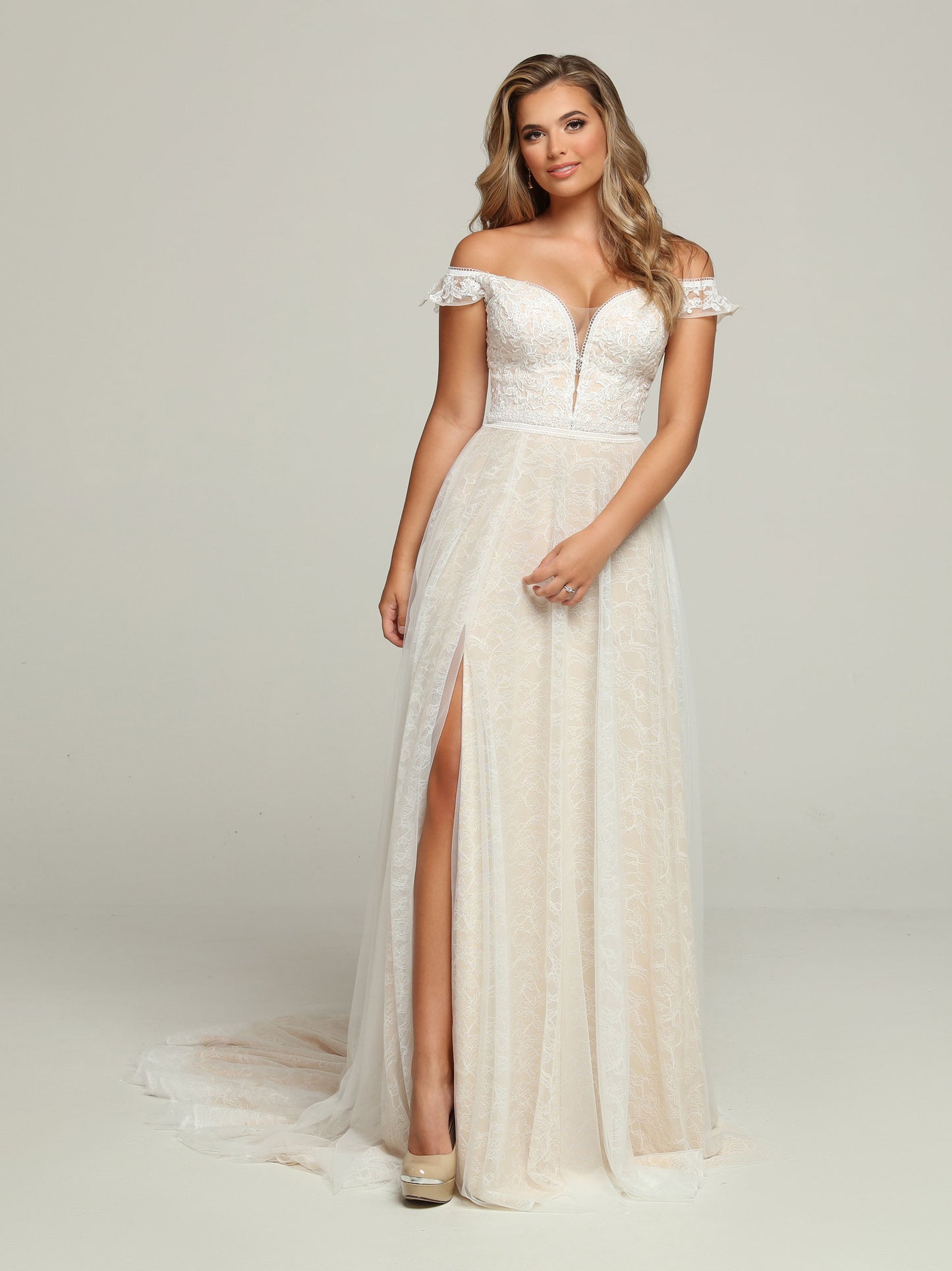 Davinci Bridal 50693 Long Lace A Line off the Shoulder Boho Wedding Dress Maxi Slit Bridal Gown Feminine & Alluring, this Lace A-Line Wedding Dress features a Plunging Sweetheart Neckline with Modesty Panel & Ruffled Off the Shoulder Straps. Lace Applique Accents the Bodice set off the Full Chapel Length Lace Skirt. A Thigh-High Slit finishes the look.
