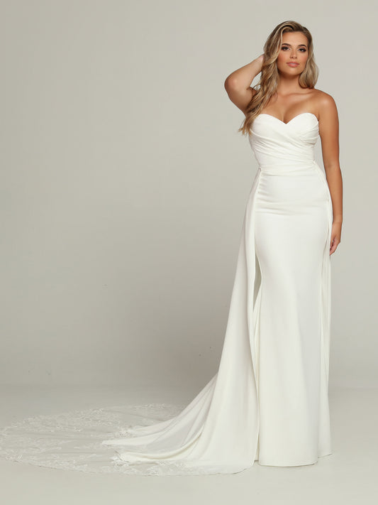 Davinci Bridal 50697 Destination Fitted Satin Wedding Dress Overskirt Bridal Gown Simple Feel like a Goddess in this Soft Satin Fit & Flare Sheath Wedding Dress. The Ruched Faux-Wrap Bodice features a Strapless Sweetheart Neckline & Center Back Detail. Remove the Overskirt with its Sheer Lace Chapel Train to reveal an Elegant Minimalist Sheath with a Sweep Train.