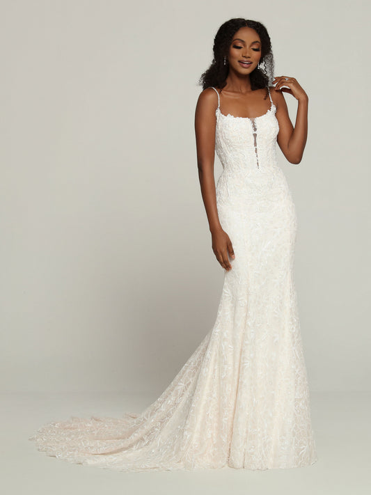 Davinci Bridal 50702 Long Fit & Flare Lace Wedding Dress Plunging Neckline Bridal Gown This Lace Sheath Fit & Flare Wedding Dress features a Modest Scoop Neckline with a Sheer Front Detail for a Stylish Slip Dress Vibe. Beaded Shoulder Straps Lead to the Deep V-Back. Lace Applique Highlights the Bodice & Skirt to the Knee. A Chapel Train finishes the Look.