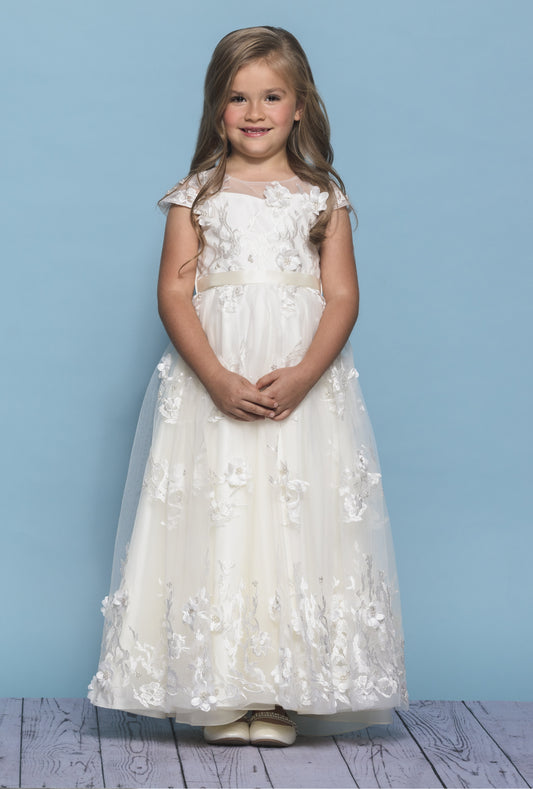 Rosebud Fashions Style 5137 is a full length dress featuring a 3D flower and vine motif with an illusion bodice and cap sleeves. The ribbon at the waist ties to a bow in the back. Satin buttons cover the zipper. Floral Applique Flower Girl Dress. 