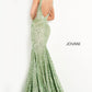 Long Jovani 59762 Prom Dress, Featuring a plunging neckline & A Fully sequined Fitted Mermaid Bodice. This Open V Back Pageant Gown & prom dress is perfect for the stage is has a lush trumpet sequin embellished skirt and sweeping train. 