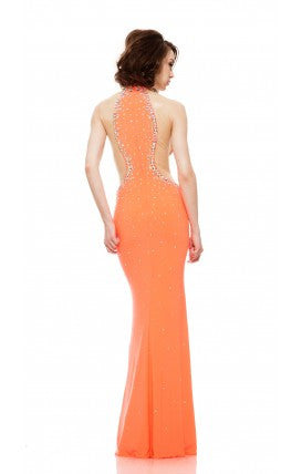 Fluted as a champagne glass, this flirty stretch jersey gown has curvaceous lines and nude mesh illusion sides. The choker neckline and body of the dress are embellished with A/B crystals. High neckline choker, sheer embellished sides. Neon Embellished sheer panel pageant gown  Fabric: Stretch Jersey, Mesh  Colors:  Coral  Size: 6