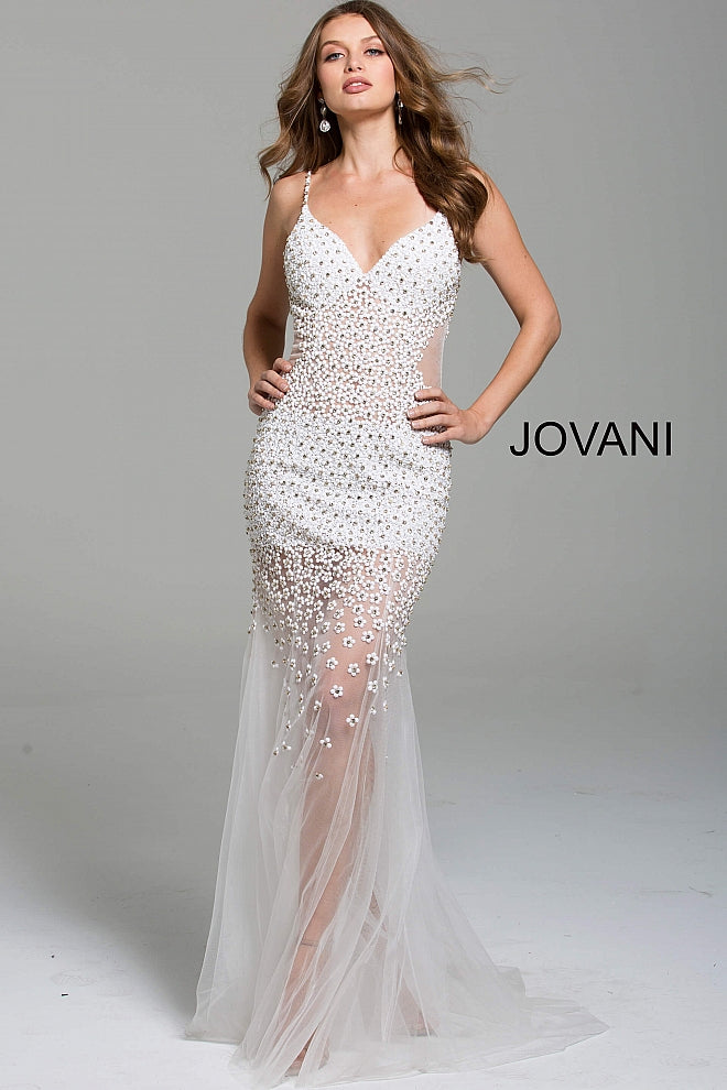 Jovani 60695 is a Sheer Prom Dress, Pageant Gown & Formal Evening Wear gown. This v neckline with spaghetti straps embellished with floral beading in off white with sheer skirt. Would be a great sexy wedding dress   Details:  beaded formal dress with spaghetti straps and v neckline, plunging v-shaped back and sleeveless bodice, sheer tulle back, sides and skirt with gentle flare. Neckline:  V-neck