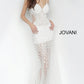 Jovani 60695 is a Sheer Prom Dress, Pageant Gown & Formal Evening Wear gown. This v neckline with spaghetti straps embellished with floral beading in off white with sheer skirt. Would be a great sexy wedding dress   Details:  beaded formal dress with spaghetti straps and v neckline, plunging v-shaped back and sleeveless bodice, sheer tulle back, sides and skirt with gentle flare. Neckline:  V-neck