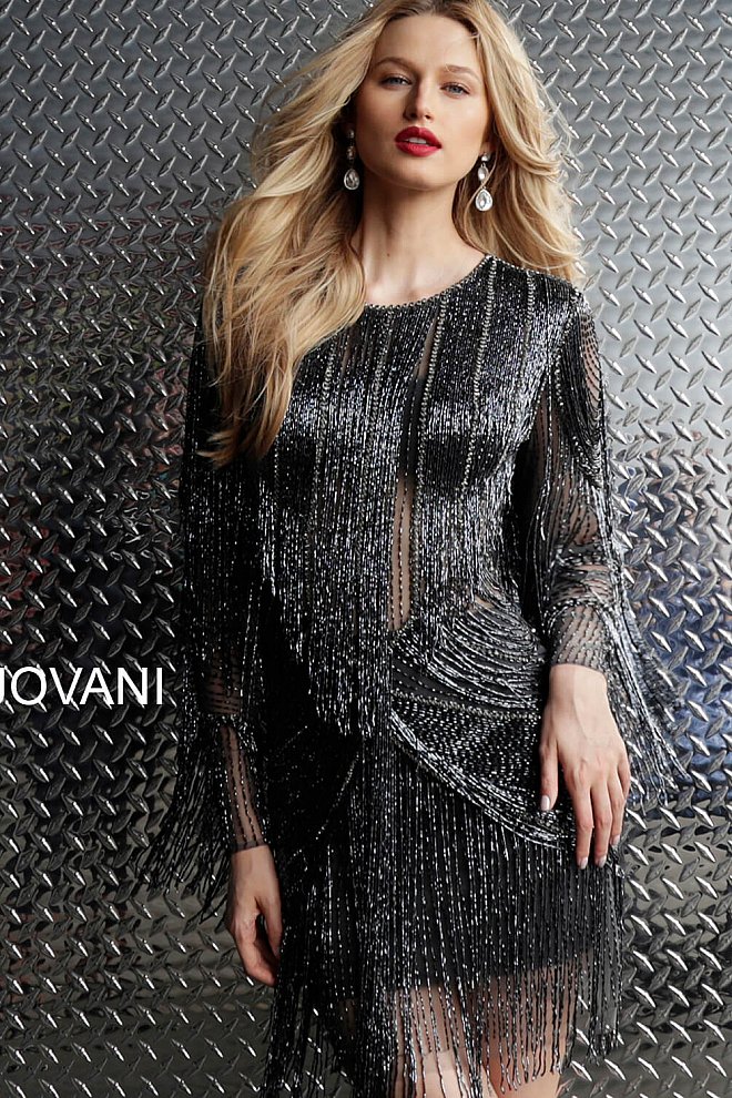 Jovani 61636 Gunmetal Fully Beaded Long Sleeve Fringe Short Cocktail Homecoming Dress. Make an unforgettable entrance in Jovani 61636. This gunmetal cocktail dress features long sleeves, fully beaded bodice, and fringe skirt with pockets. Perfect for a homecoming or special event, this breathtaking dress will have you turning heads.