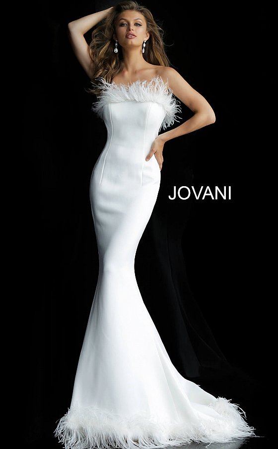 Jovani 63891 straight neckline with feather trim on the neckline and feather trim on the edge of the skirt with a sweeping train fitted mermaid evening gown wedding dress prom gown  Available colors:  Black, Navy, White  Available sizes:  00-24 