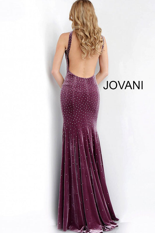 Jovani 63935 Mauve Size 0 Mauve velvet fitted prom dress featuring heat set stones with a high neckline, keyhole sleeveless bodice and open back, floor-length fitted skirt with flared end and side high slit. Prom Dress Pageant Gown Evening Dress 