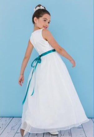 Rosebud Fashions Style 5111 is a full length sleeveless dress with a v- neckline. It contains a natural waist with a ruched bodice. The ribbon at the waist ties to a bow in the back. Satin buttons cover the zipper. Flower Girl & First Communion Dress  Available Sizes: 2,4,6,8,10,12,14,16  Available Colors: White, Ivory
