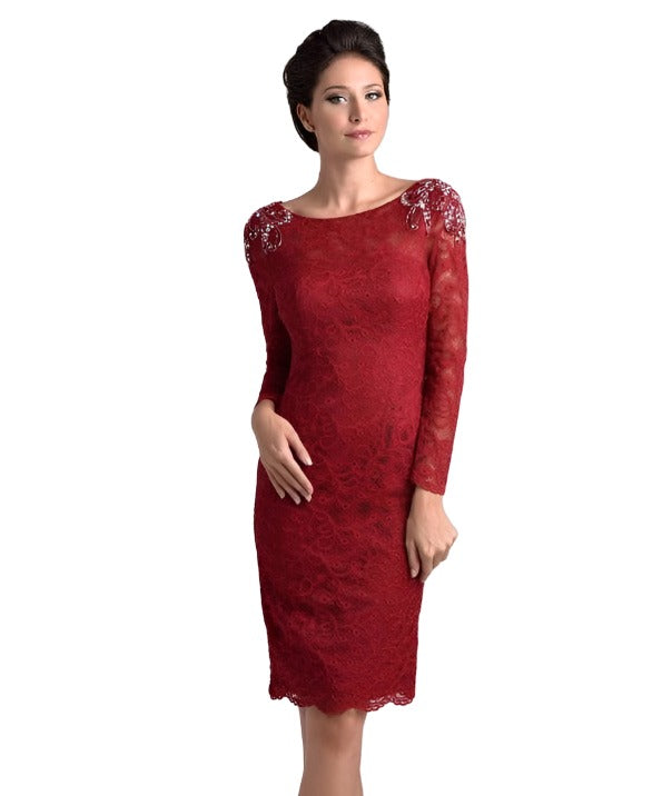 Nina Canacci M208 is a short fitted lace knee length cocktail dress. Sheer High lace neckline with long sleeves. beading, Crystal Rhinestones & Embellishments adorn the shoulder on this great mother of the bride/groom style. Available Sizes: 6, 8, 10  Available Colors: Brown