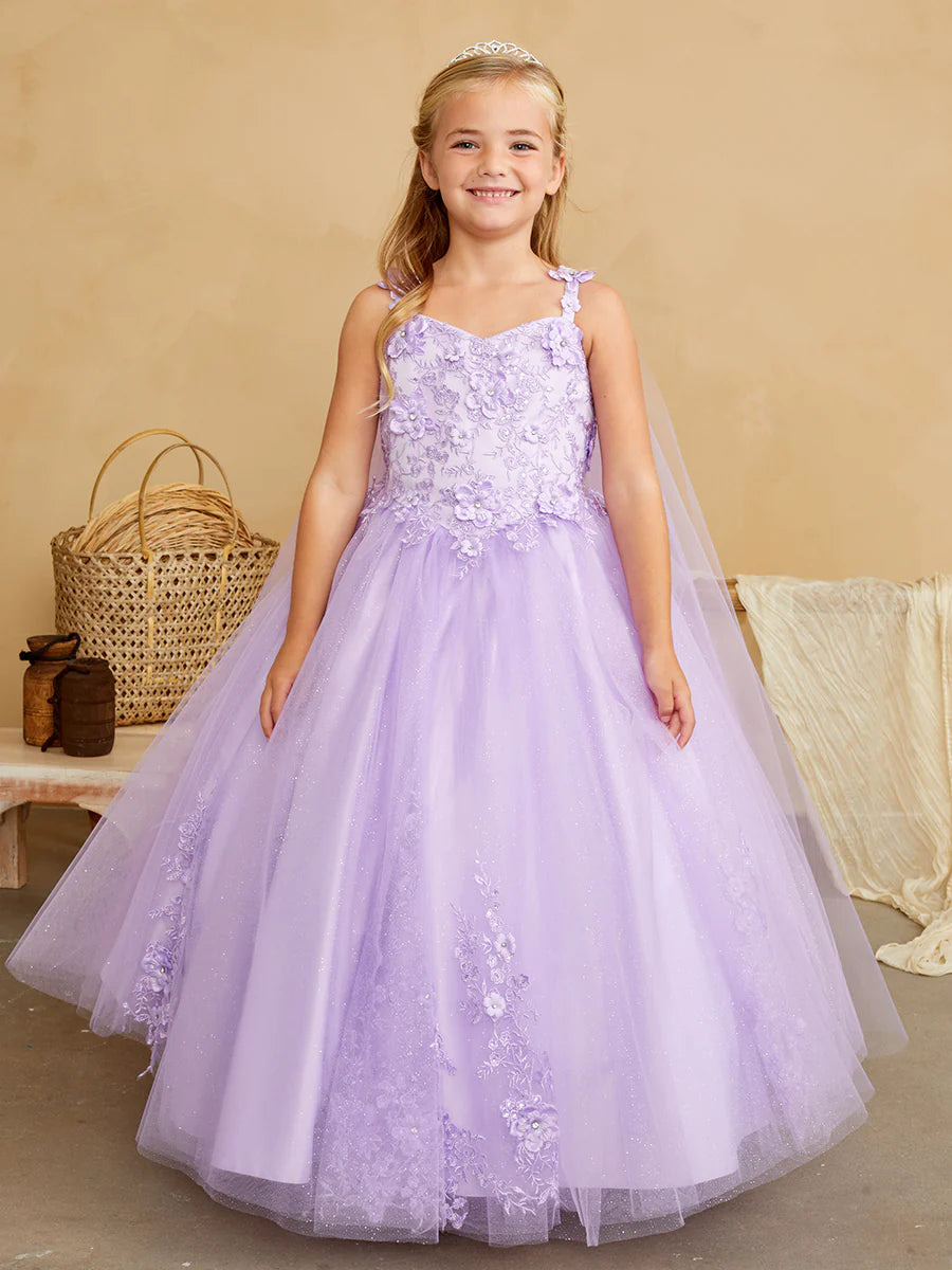 The Tip Top 7040 Long Glitter Lace Girls Pageant Dress is an elegant choice for any special occasion. Crafted from high-quality glitter lace fabric, this dress features a detachable cape with floral appliques. The perfect dress for flower girls and pageant hopefuls.   Floral lace bodice with 3D flowers Floor length glitter tulle skirt with floral applique 3D flowers on the straps Has a detachable cape