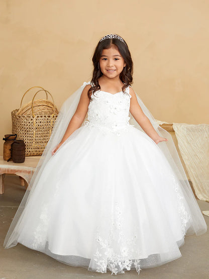 The Tip Top 7040 Long Glitter Lace Girls Pageant Dress is an elegant choice for any special occasion. Crafted from high-quality glitter lace fabric, this dress features a detachable cape with floral appliques. The perfect dress for flower girls and pageant hopefuls.   Floral lace bodice with 3D flowers Floor length glitter tulle skirt with floral applique 3D flowers on the straps Has a detachable cape