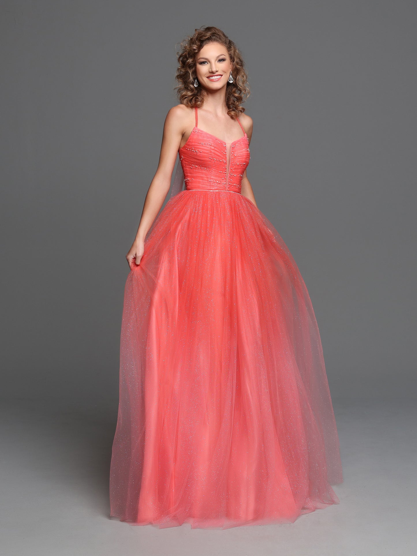 Sparkle Prom 72242 Long Orange Shimmer A Line Prom Dress Halter Ballgown Princess style ruched bodice with beaded Rhinestone waistline and scattered embellishments across the gowns top. Plunging sheer illusion v neckline with peak points.  Colors: Orange  Sizes: 0-20