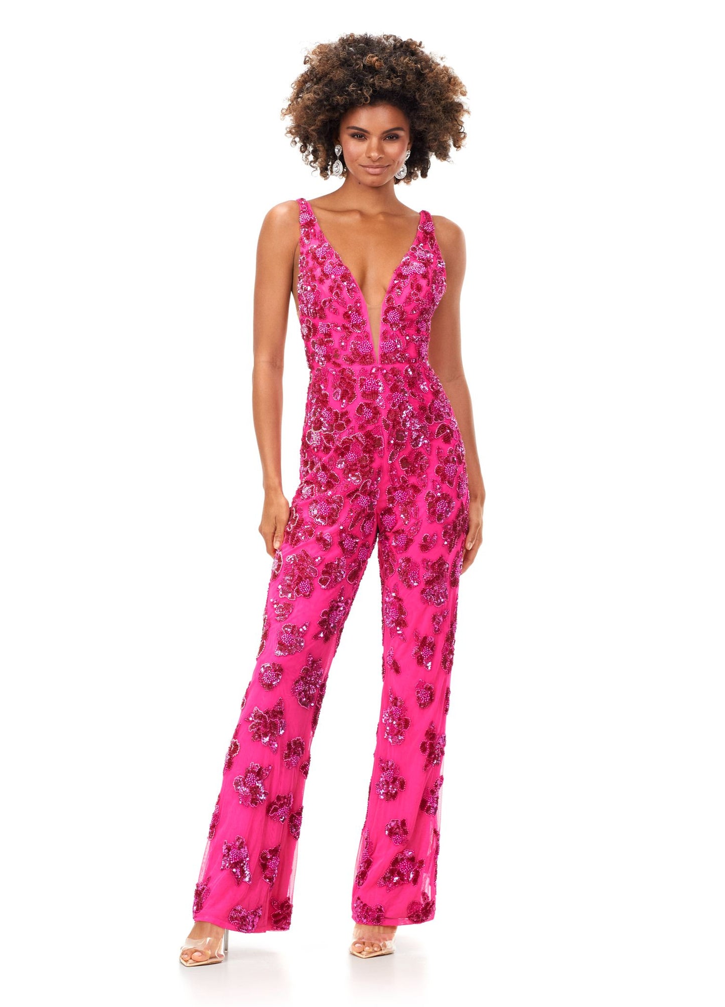 Ashley Lauren 11355 This v-neckline jumpsuit features an intricate floral inspired bead pattern throughout. The look is complete with a v-back and straight leg pants. V-Neckline V-Back Straight Leg Pants Fully Hand Beaded COLORS: Ivory, Neon Pink, Royal