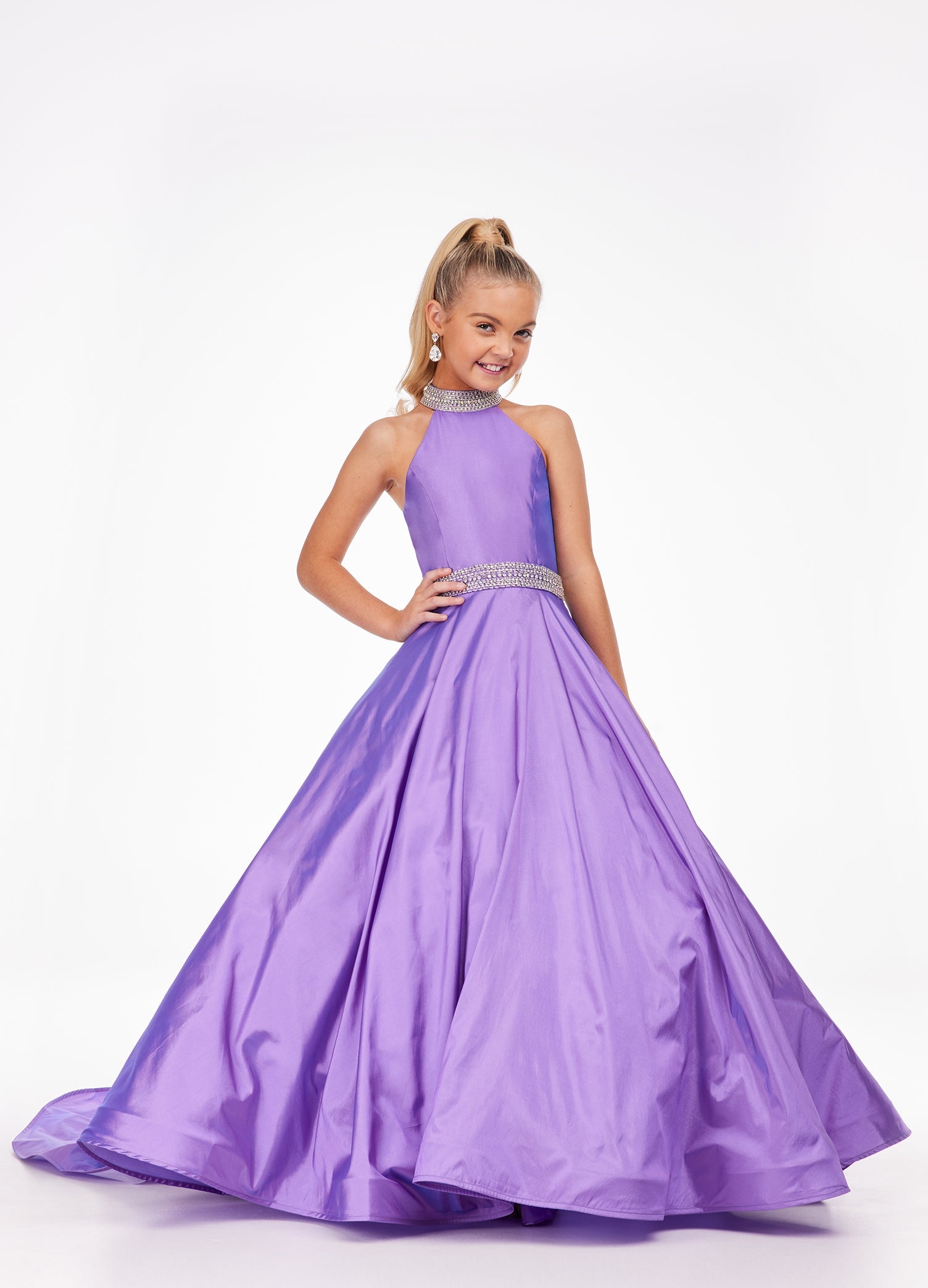 Ashley Lauren Kids 8117 This simple yet sophisticated girls and preteen pageant dress features a halter neckline with beaded collar. The same bead pattern is carried down onto the waist giving way to a full A-Line skirt with sweeping train.  Available colors:  Fuchsia, Purple  Available sizes:  4, 6, 8, 10, 12, 14
