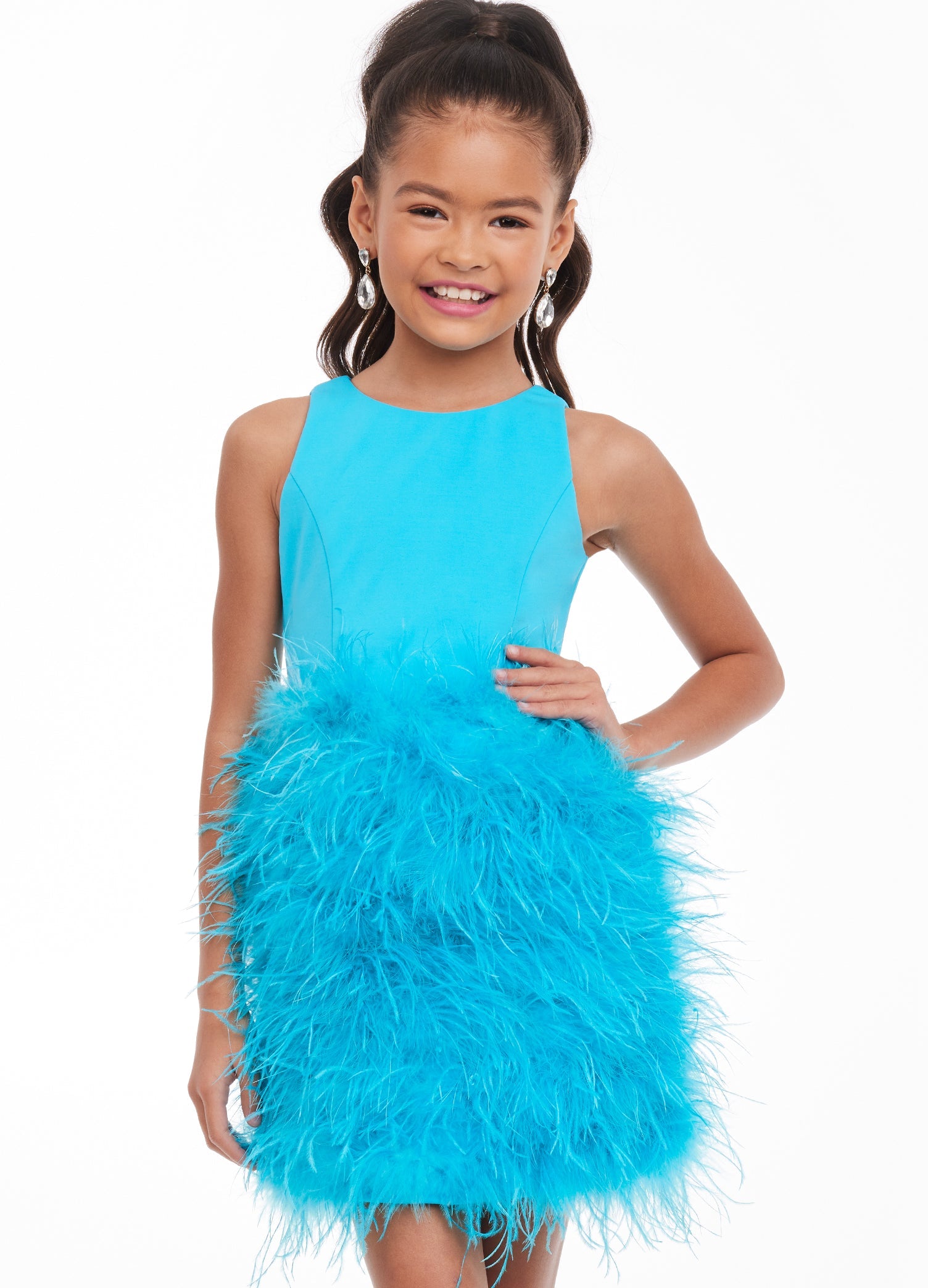 Ashley Lauren Kids 8132 Short Feather skirt cocktail girls Pageant Dress Cutout back Fabulous in feathers! This kids cocktail dress features a scuba bustier giving way to a full feather skirt and open back. Crew Neckline Open Back Scuba Feathers Available Sizes: 2-16 Available Colors: Turquoise, Hot Pink, White