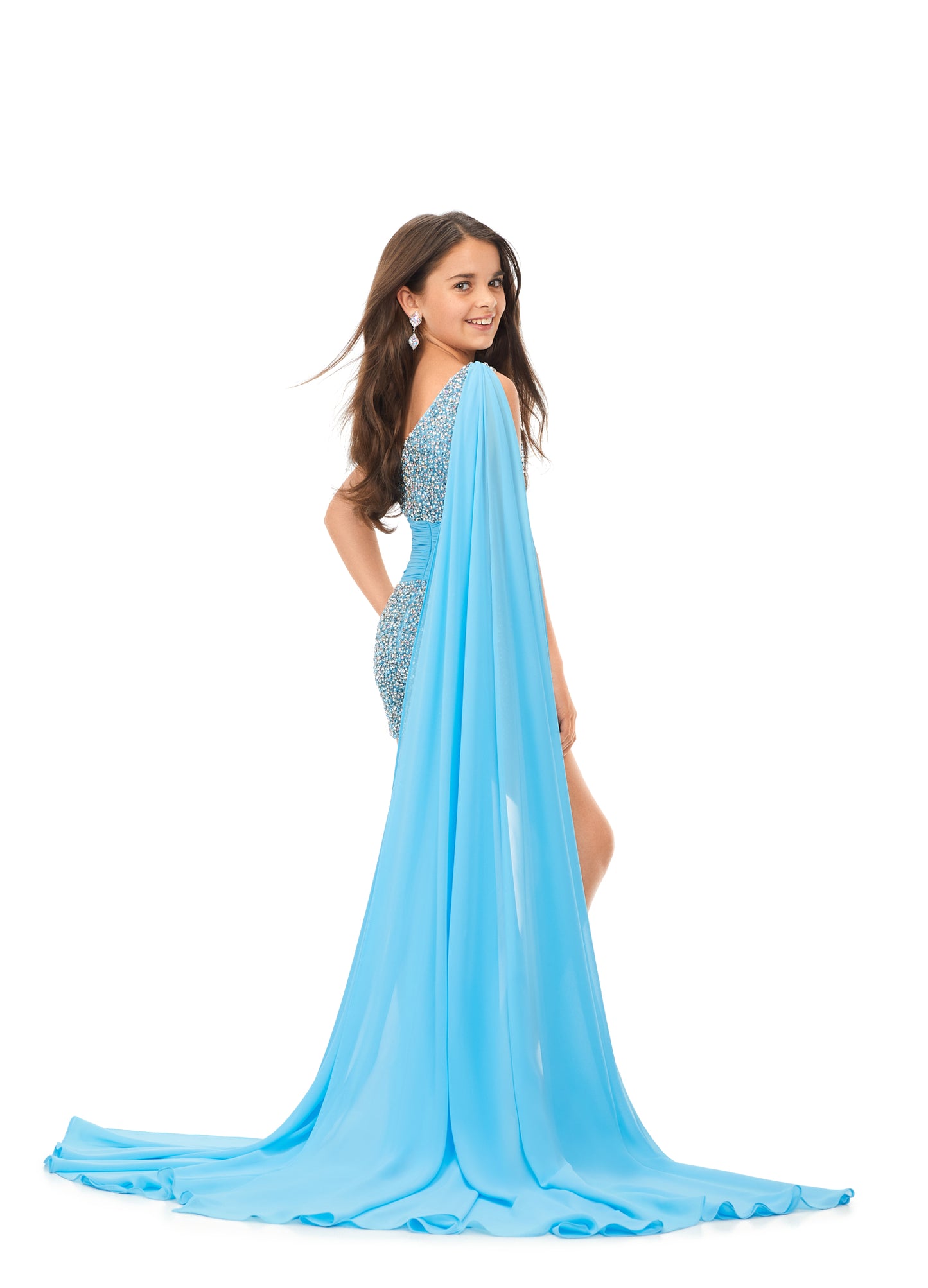 Ashley Lauren Kids 8151 One Shoulder Crystal Beaded Romper Chiffon Cape Pageant Fun Fashion This stunning kids one shoulder romper features pearls and crystals throughout. The look is completed with an attached chiffon shoulder cape. One Shoulder Chiffon Cape Romper COLORS: Orchid, Yellow, Neon Pink, Light Blue Sizes: 2,4,6,8,10,12,14,16