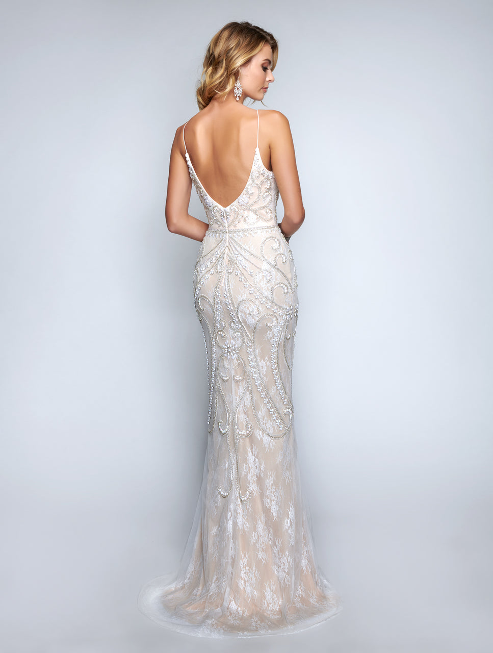 Nina Canacci 8170  Prom Dress Pageant Gown & Destination wedding dress.  Iridescent Beading, Pearl & Crystal embellished bodice with a tulle overlay on Delicate lace. V Neckline with spaghetti straps. embellished mermaid evening gown with spaghetti straps   Available Colors: Ivory/nude  Available Sizes: 10, 12