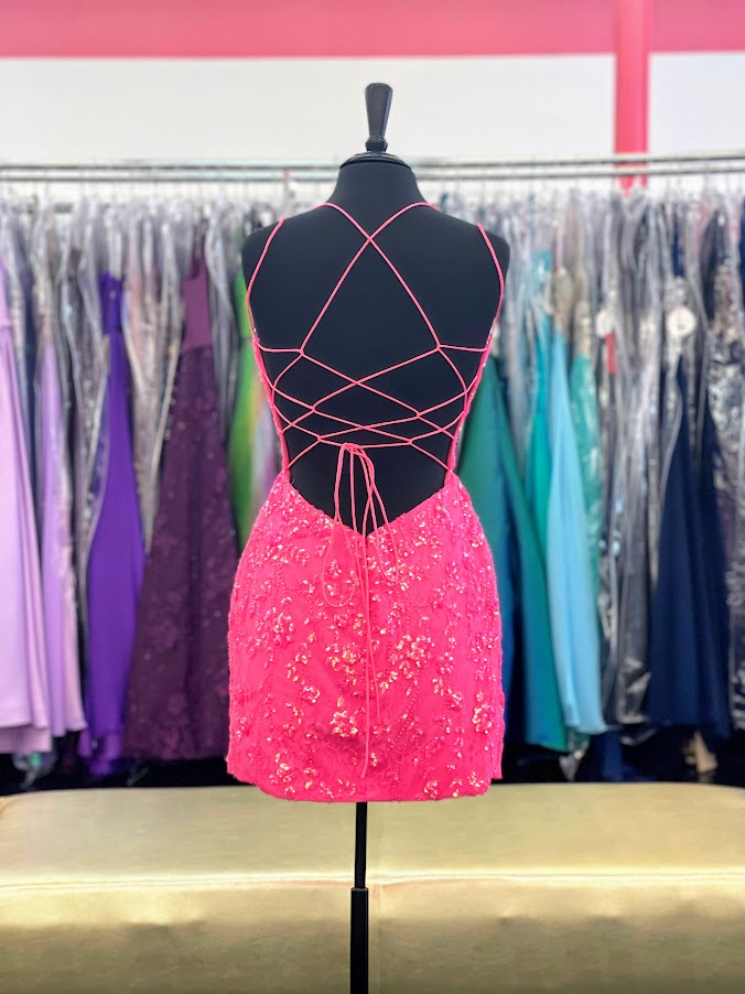 Amarra 87129 Short Fitted Lace Gown with Sequin Embellishments. This Backless Cocktail Dress Features a lace up tie Corset V neckline with mesh insert. Neon Pink sz 0, 6, 12  Available Sizes: 0, 6, 12  Available Colors: Neon Pink
