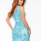 Ashley Lauren 4509 This ravishing hand beaded cocktail dress features a one shoulder neckline and illusion side. The perfectly placed bead pattern cinches the waist to perfectly accentuate your curves. The look is completed with a full zipper back and fitted skirt.  Available Colors:  Emerald, Royal/Turquoise, Neon Blue, Multi/Black, Nude, Red
