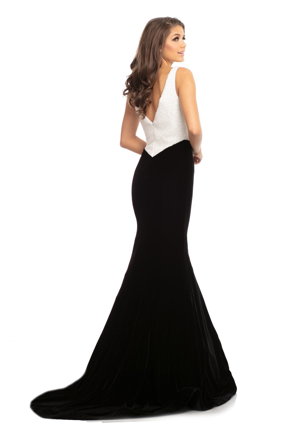 Johnathan Kayne 9019 is a velvet mermaid Prom Dress Pageant Gown & Formal Evening Wear. Long fitted mermaid silhouette with a basque waistline. Fully Embellished bodice is covered in crystal studs and beading. Plunging neckline with mesh insert.