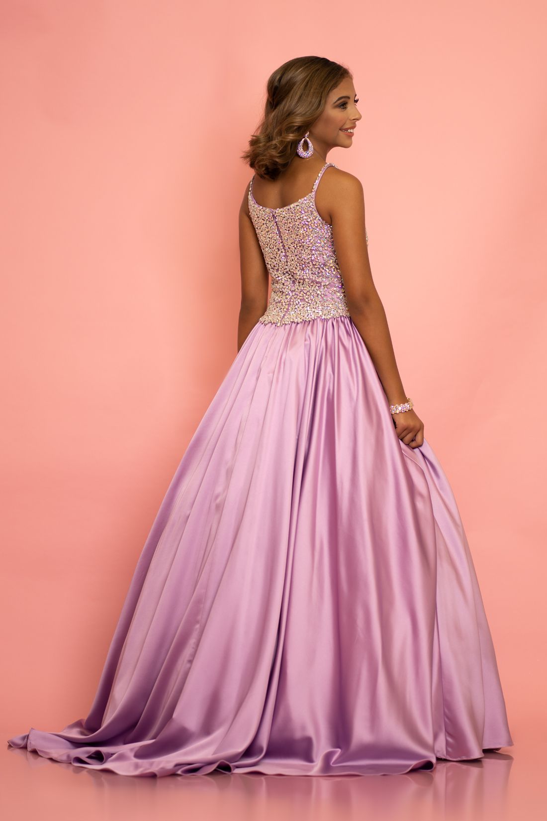 Sugar Kayne C134 by Johnathan Kayne Girls and Preteens long pageant gown with stone encrusted bodice with and embellished spaghetti straps.  The full ballgown skirt is made of Duchess Satin and has a sweeping train.  Available colors:  Hot Coral, Orchid, White  Available sizes:  2, 4, 6, 8, 10, 12, 14, 16 