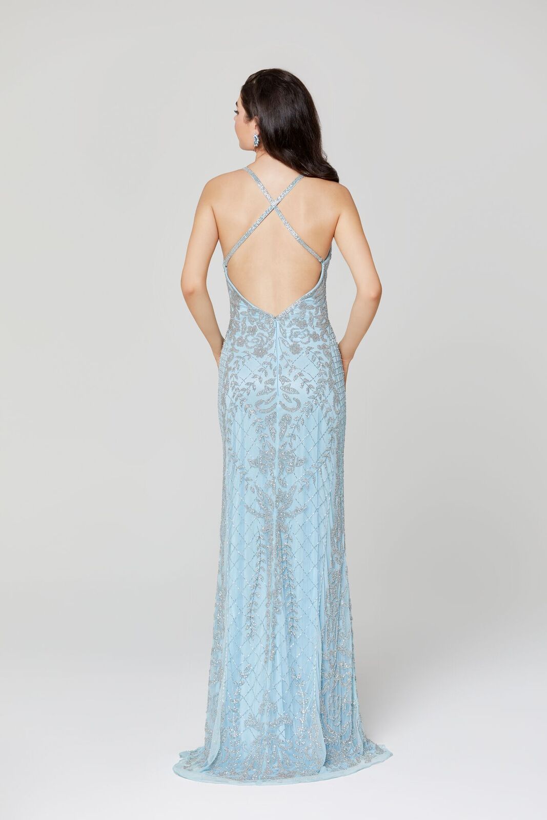 Primavera Couture 3428 is a beaded sequins Prom Dress, Pageant Gown, Wedding Dress & Formal Evening Wear gown. This Gown Features a v neckline with spaghetti straps that criss cross in the open back 