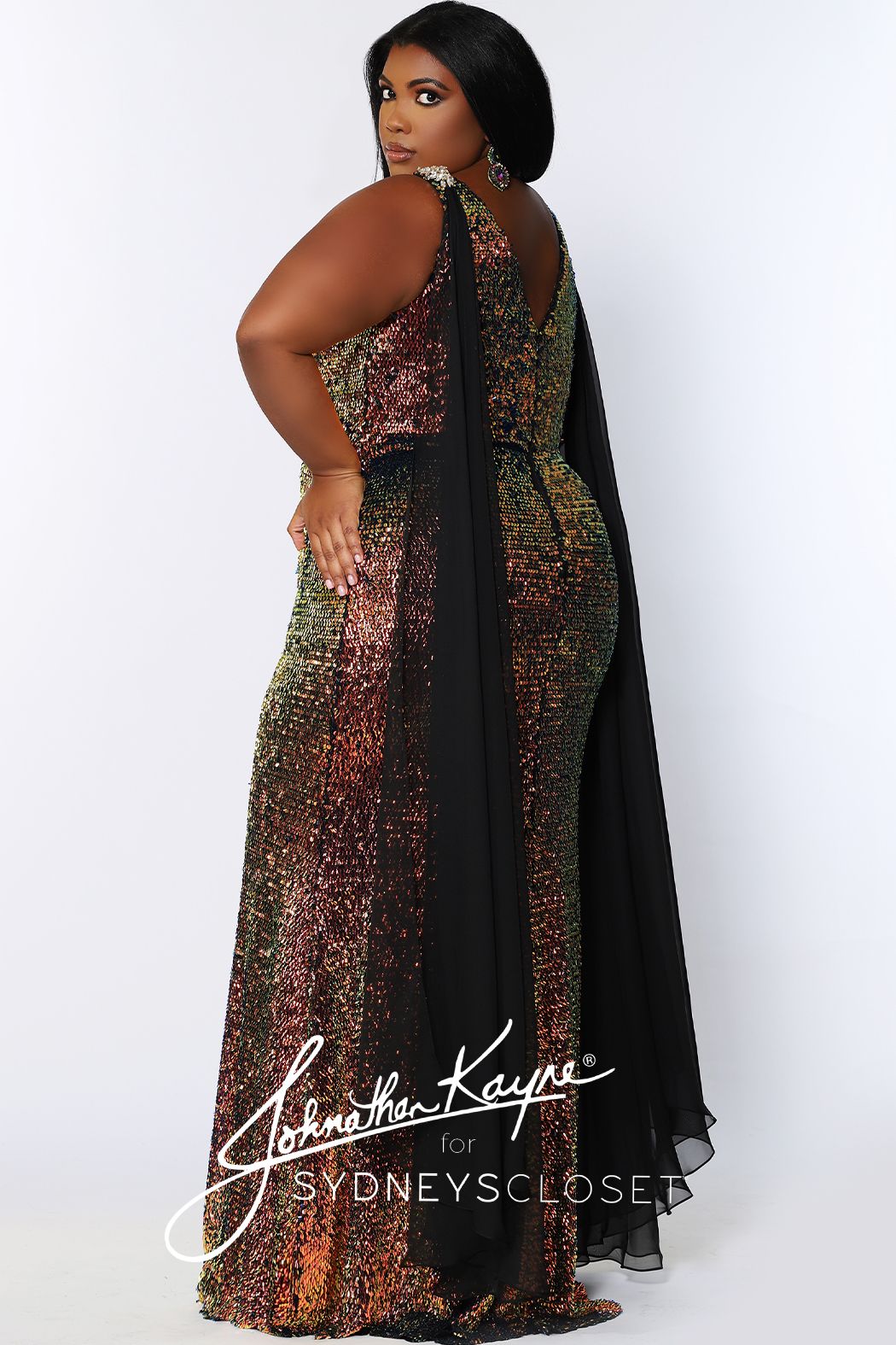 Johnathan Kayne for Sydney's Closet JK 2109 Aurora fitted plus sized sequin mermaid prom dress with shoulder capes.  The flowy scarves on this pageant gown are detachable.  This long evening gown has a plunging v neckline with a mesh panel.   JK2109