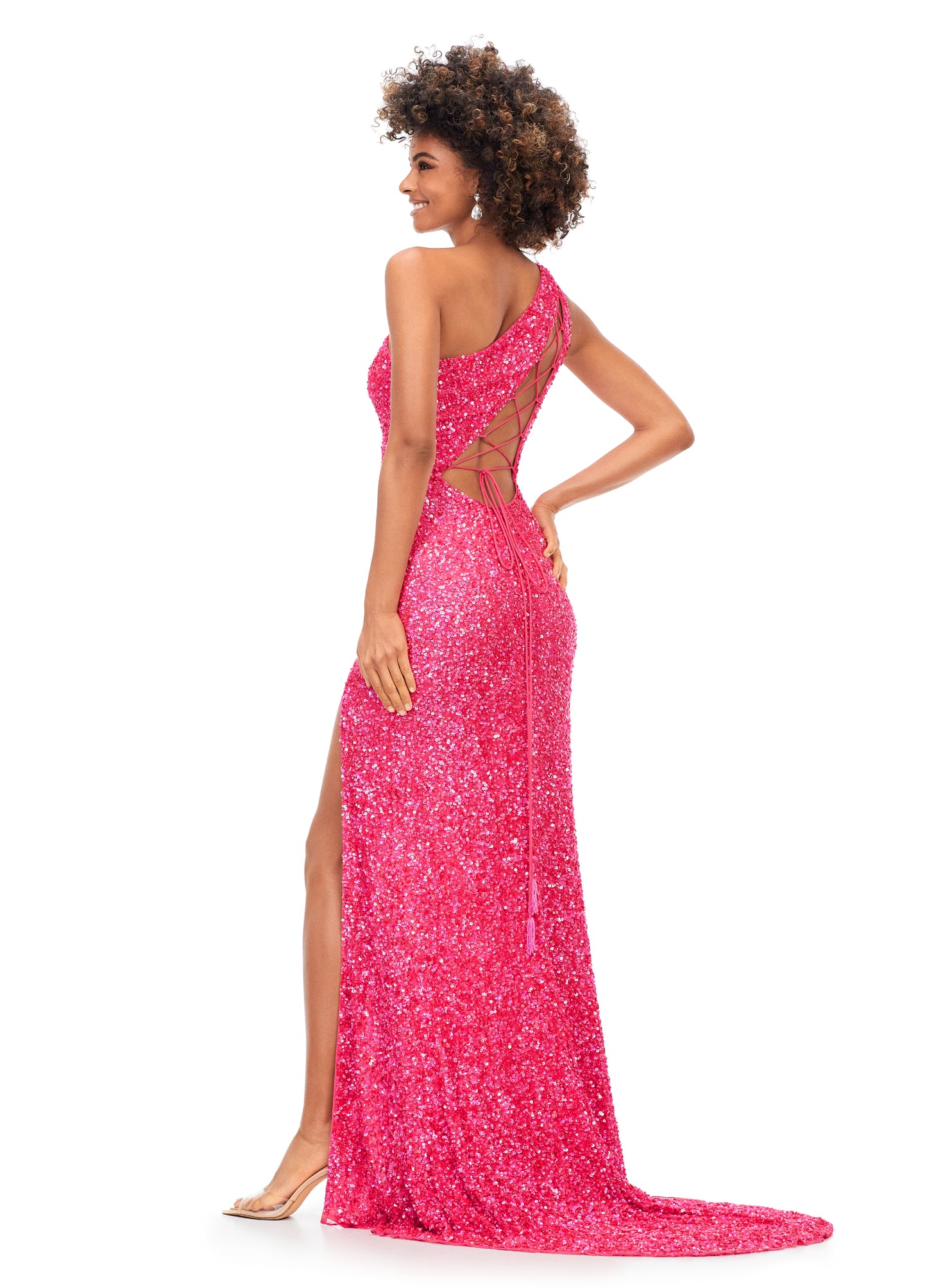 Ashley Lauren 11144 Electric Orchid Long Sequin One Shoulder Prom Dress with Lace up Back  Dazzle the night away in this one shoulder sequin gown featuring an asymmetrical lace up back and left leg slit.