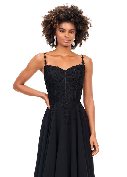Ashley Lauren 11332 This classic chiffon prom, pageant and evening dress features a sweetheart neckline with spaghetti straps. The bustier on this dress is a corset style with lace appliques throughout. The lace appliques carry down onto the a-line skirt.