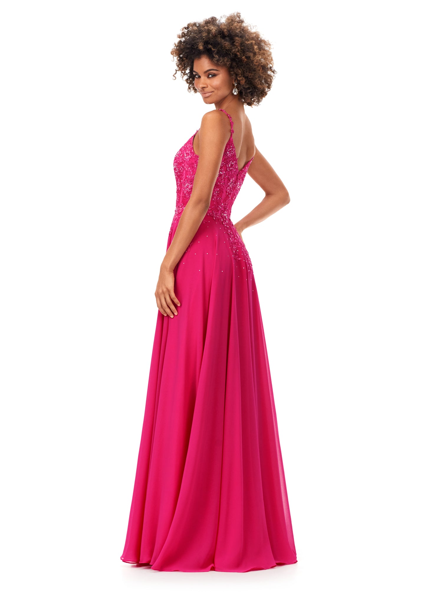 Ashley Lauren 11332 This classic chiffon prom, pageant and evening dress features a sweetheart neckline with spaghetti straps. The bustier on this dress is a corset style with lace appliques throughout. The lace appliques carry down onto the a-line skirt.