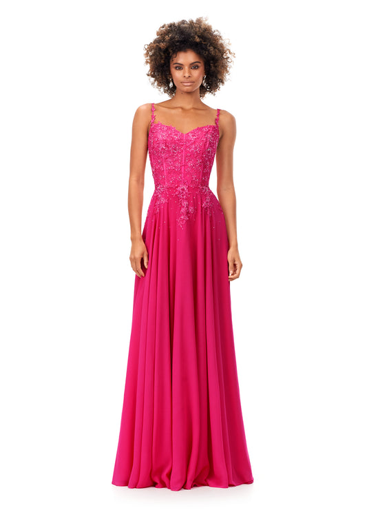Ashley Lauren 11332 This classic chiffon prom, pageant and evening dress features a sweetheart neckline with spaghetti straps. The bustier on this dress is a corset style with lace appliques throughout. The lace appliques carry down onto the a-line skirt.